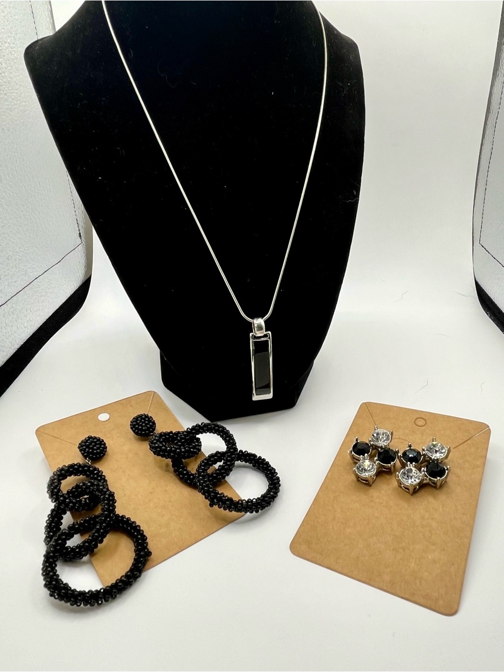 Lia Sophia Necklace. Reversible Black/White Pendant and coordinating earrings.